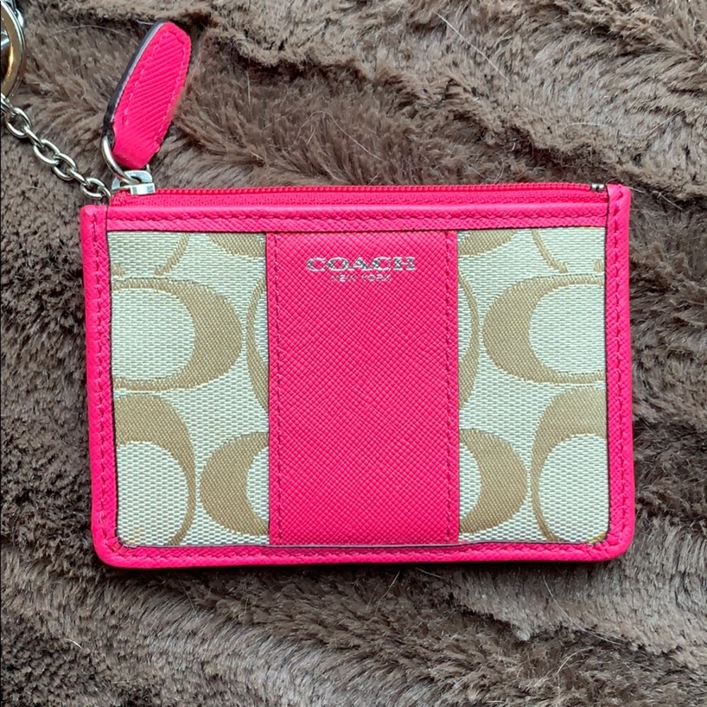 Small pink trim coach signature pattern coin purse